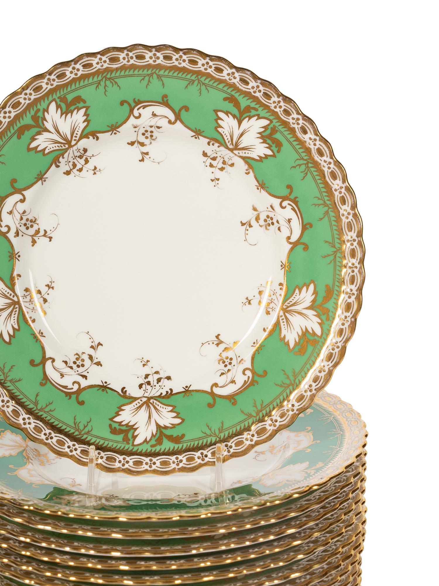 A Set of Eighteen Mintons Parcel Gilt Porcelain Dessert Plates