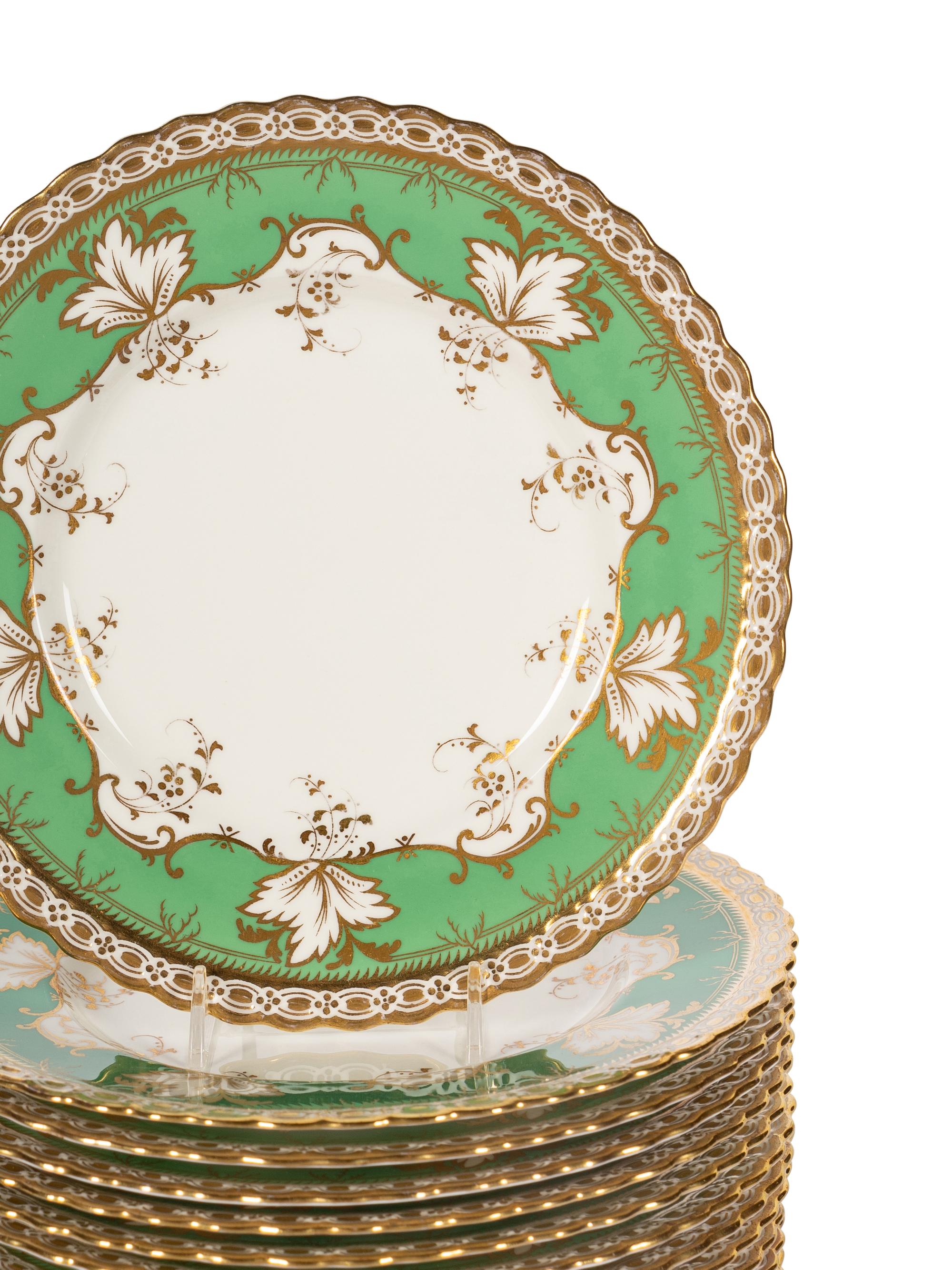 A Set of Eighteen Mintons Parcel Gilt Porcelain Dessert Plates