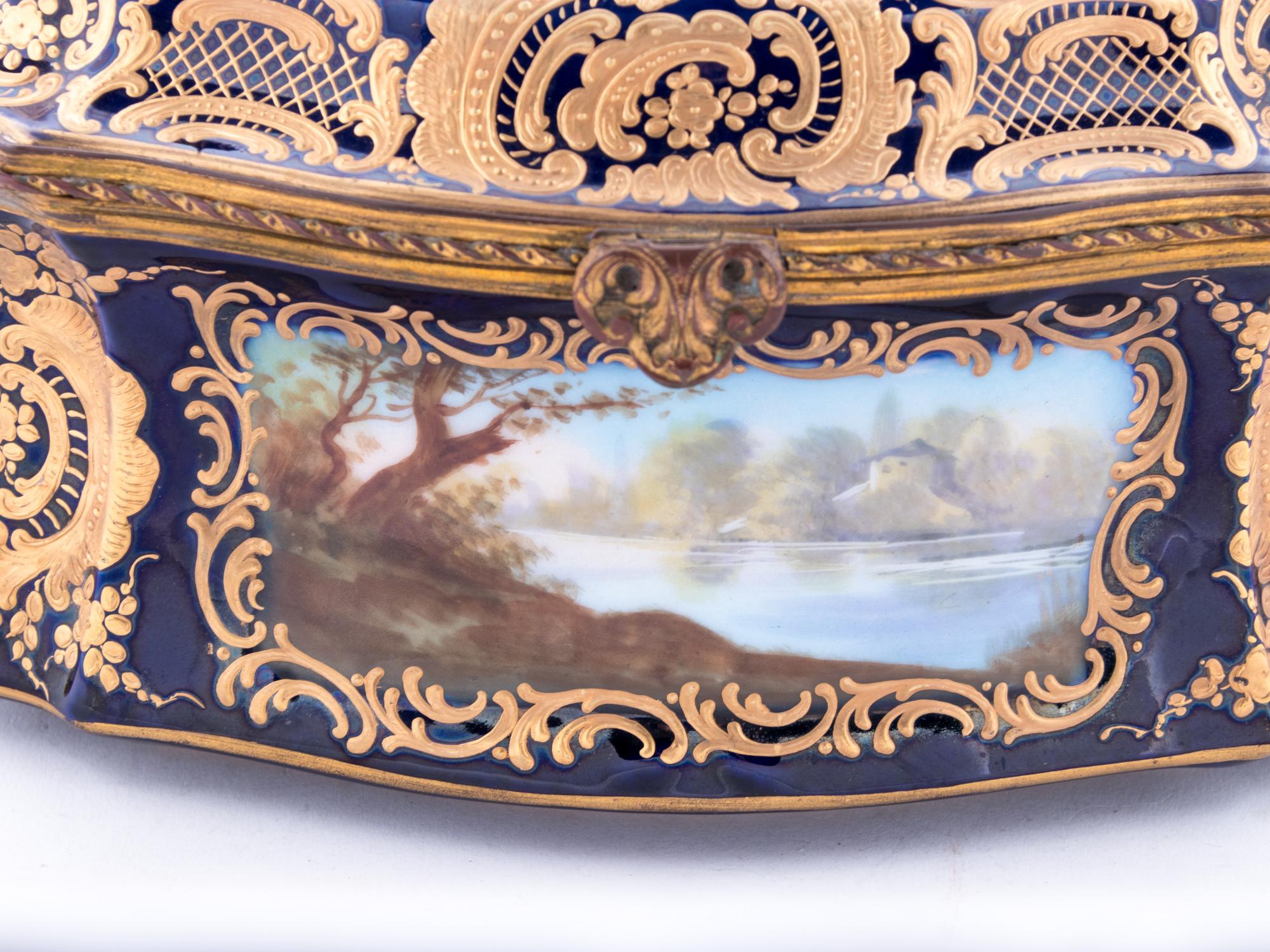 A Sèvres Style Painted and Parcel Gilt Porcelain Table Casket