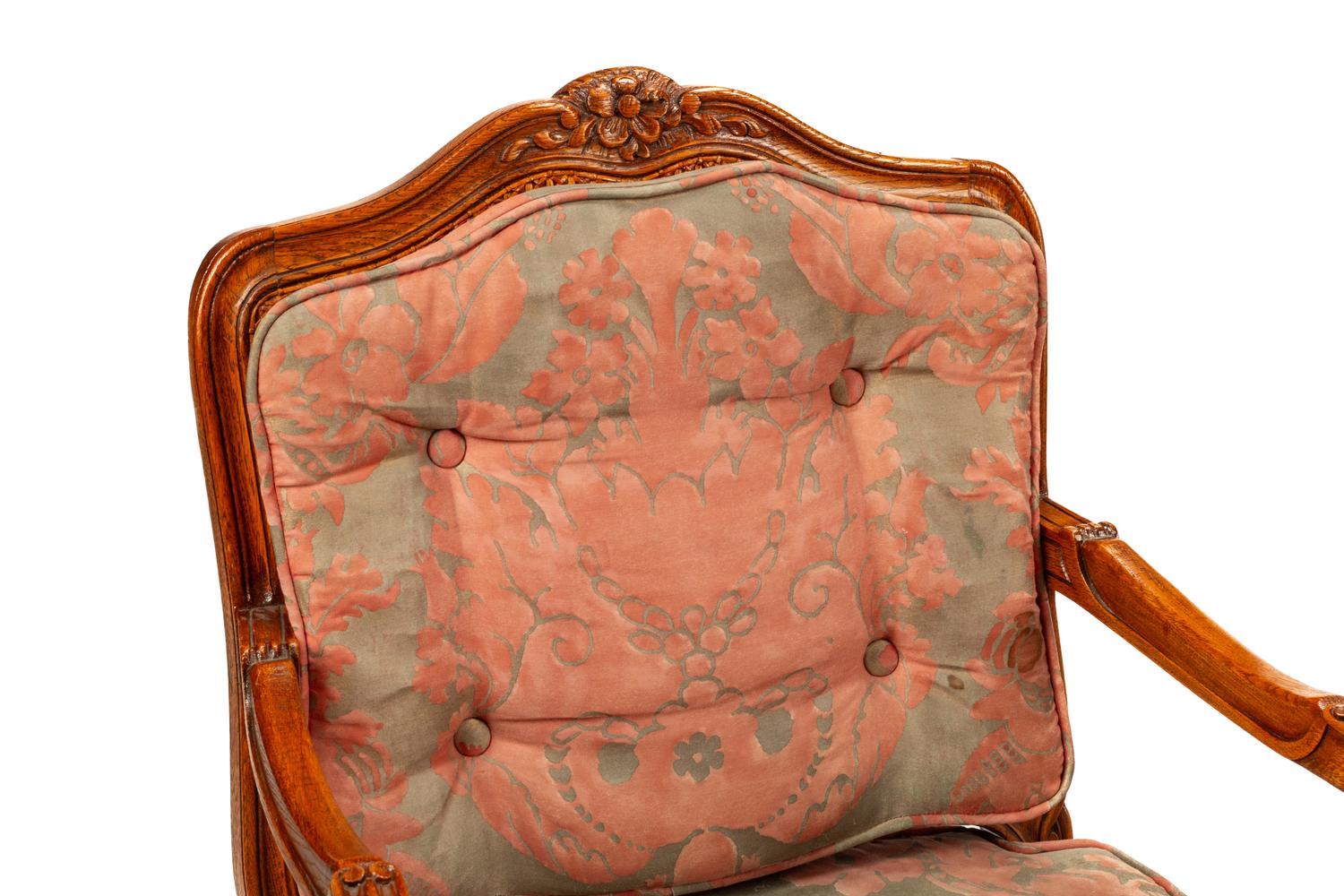 A Pair of Louis XV Style Oak Fauteuils