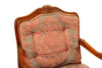 A Pair of Louis XV Style Oak Fauteuils