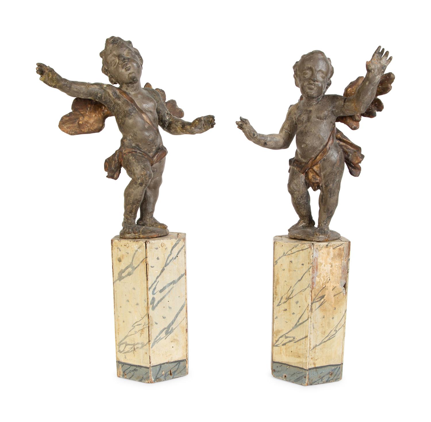 A Pair of Italian Carved Putti on Painted Faux-Marble Bases — 17TH/18TH CENTURY