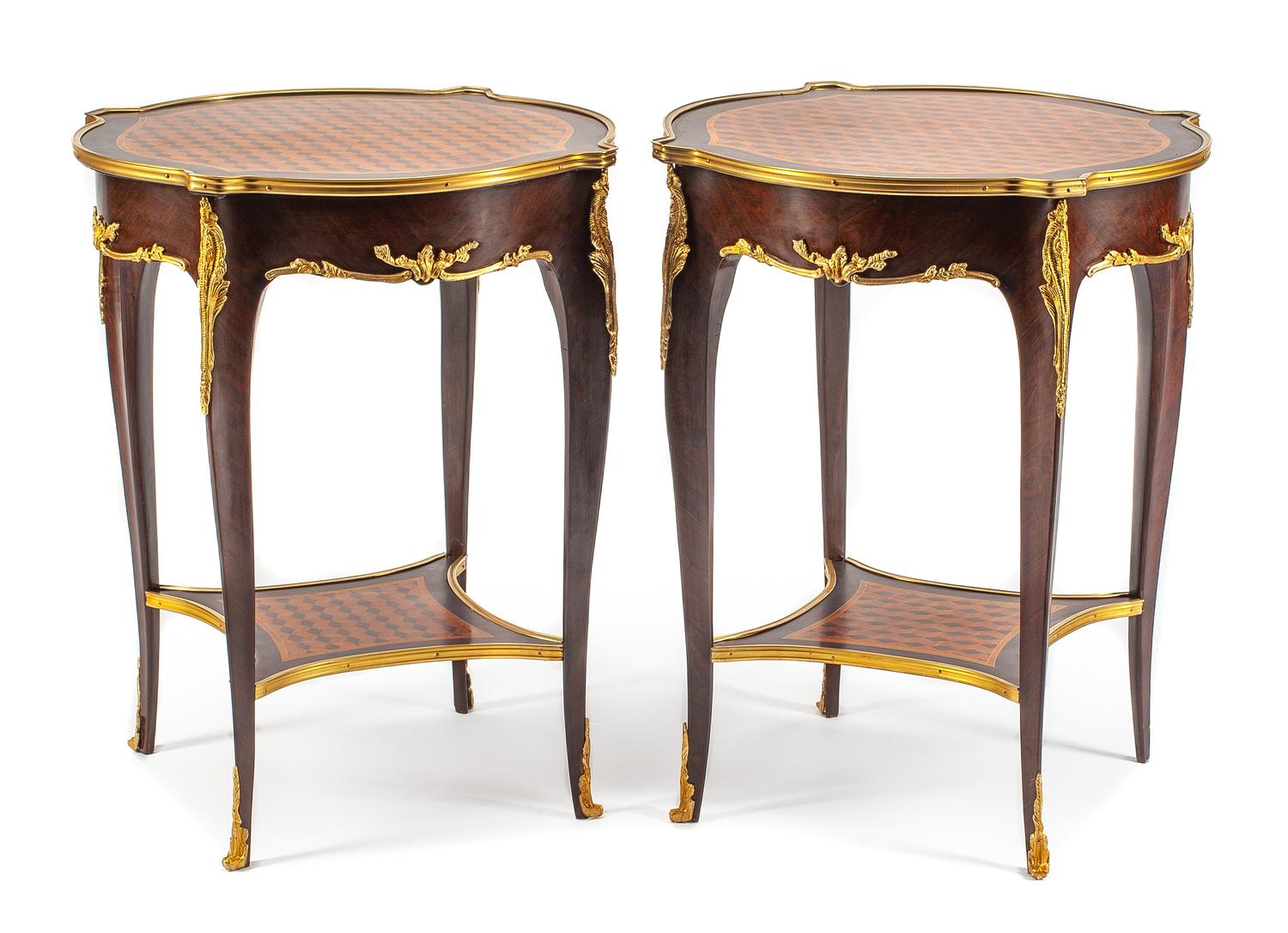 A Pair of Louis XV Style Gilt Bronze Mounted Parquetry Tables Height 28 x diameter of top 23 inches.