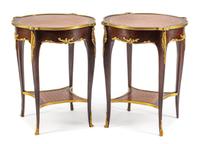 A Pair of Louis XV Style Gilt Bronze Mounted Parquetry Tables Height 28 x diameter of top 23 inches.