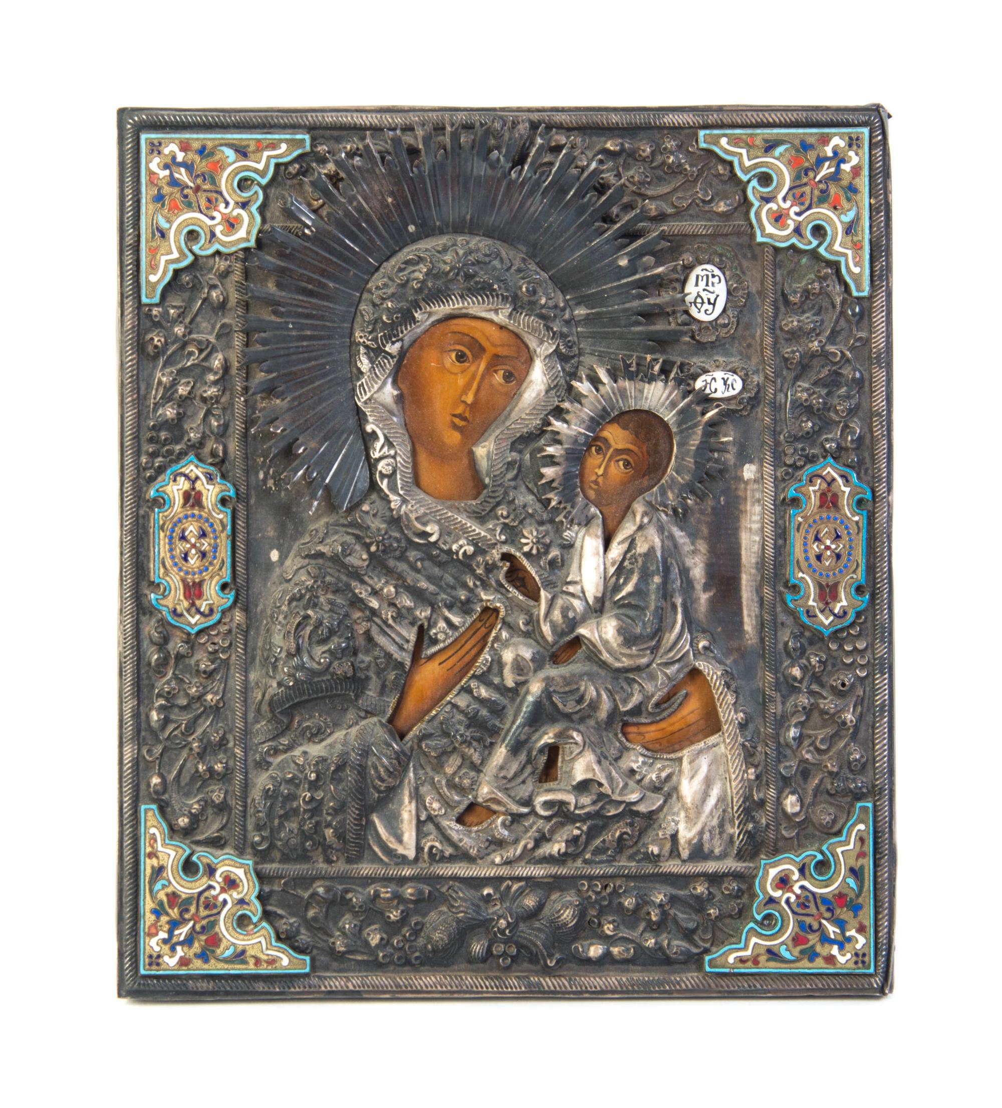 A Russian Enameled Oklad Icon, Height 12 1/2 x width 11 inches.