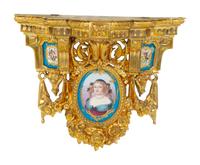 A Pair of Gilt Metal and Sèvres Style Porcelain Wall Brackets