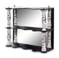 A Meissen Porcelain Mounted Ebonized Shelf