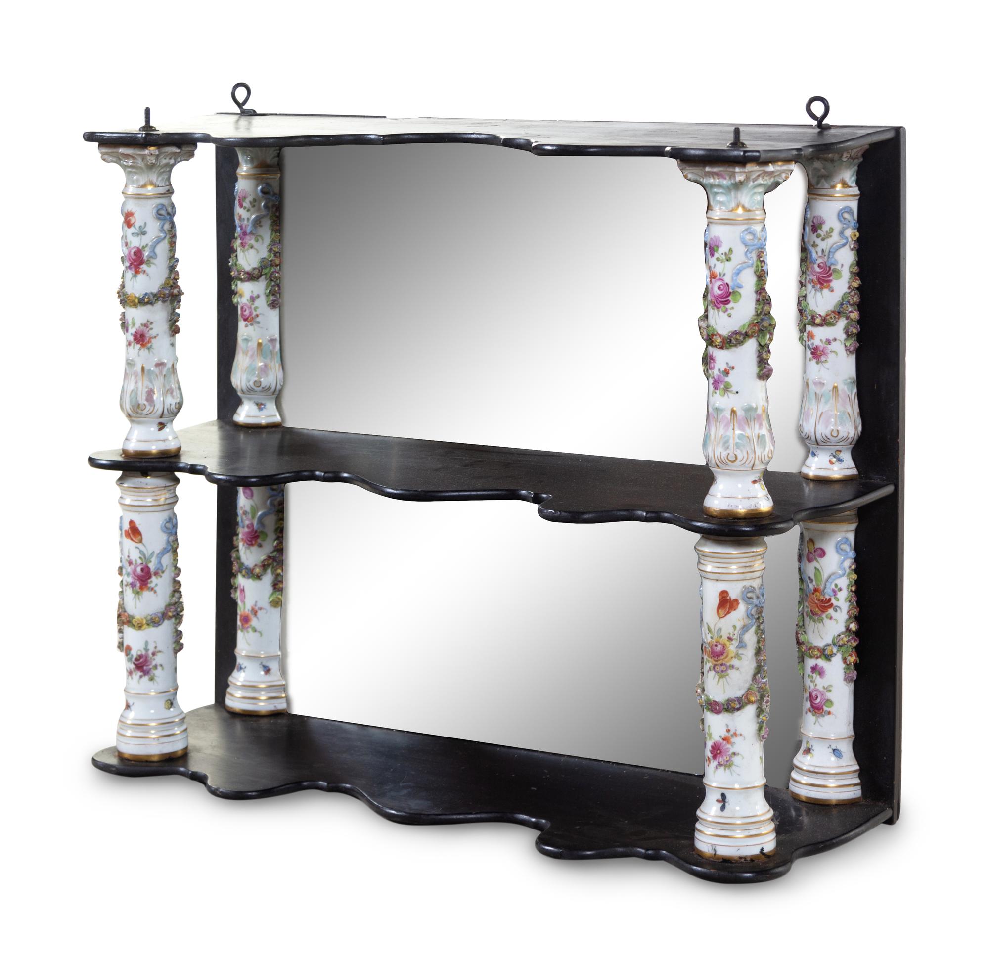A Meissen Porcelain Mounted Ebonized Shelf