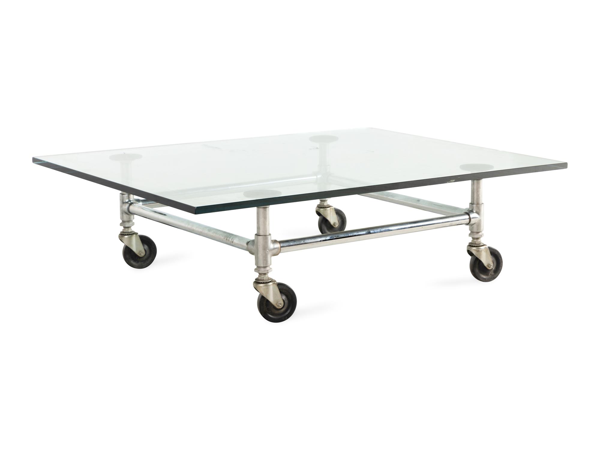A Glass-Topped Steel Low Table