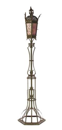 A Gothic Revival Iron Torchiere, Height 88 inches.