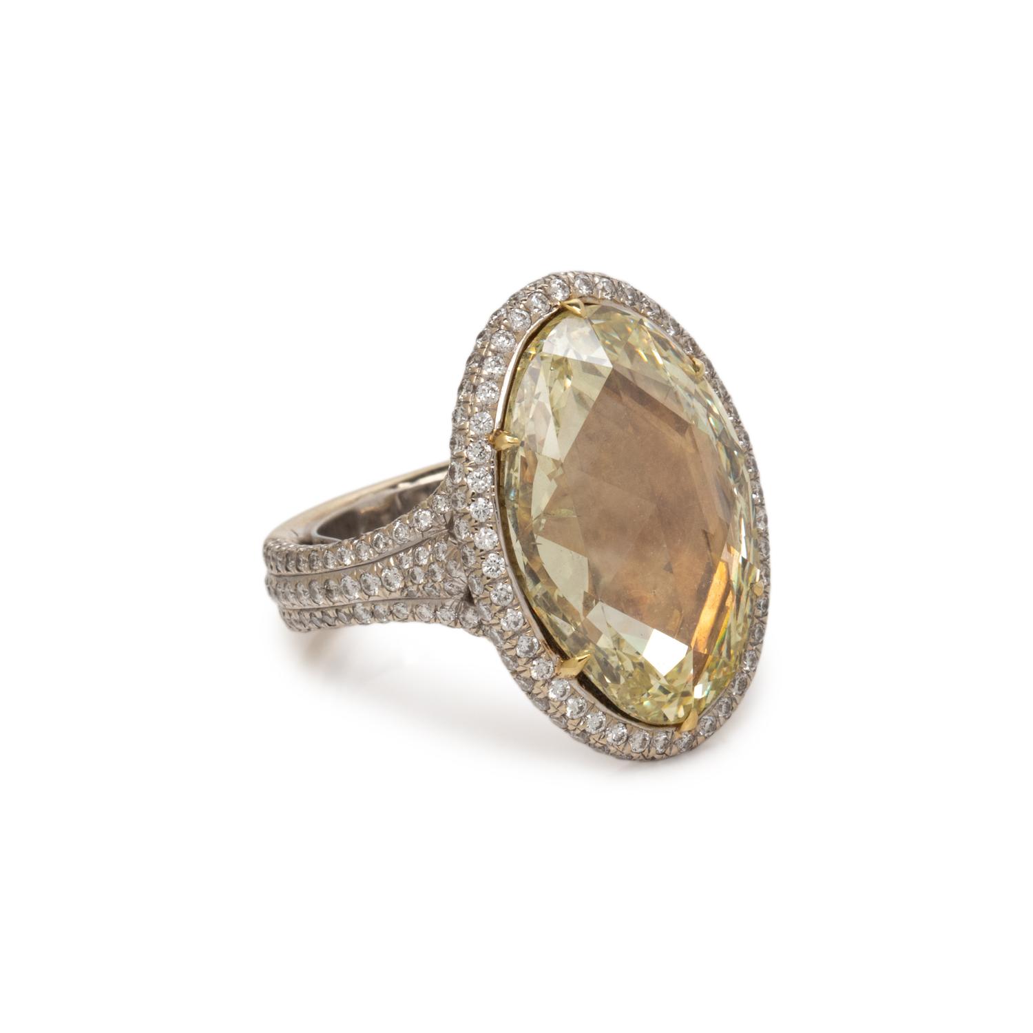 FANCY YELLOW DIAMOND AND DIAMOND RING