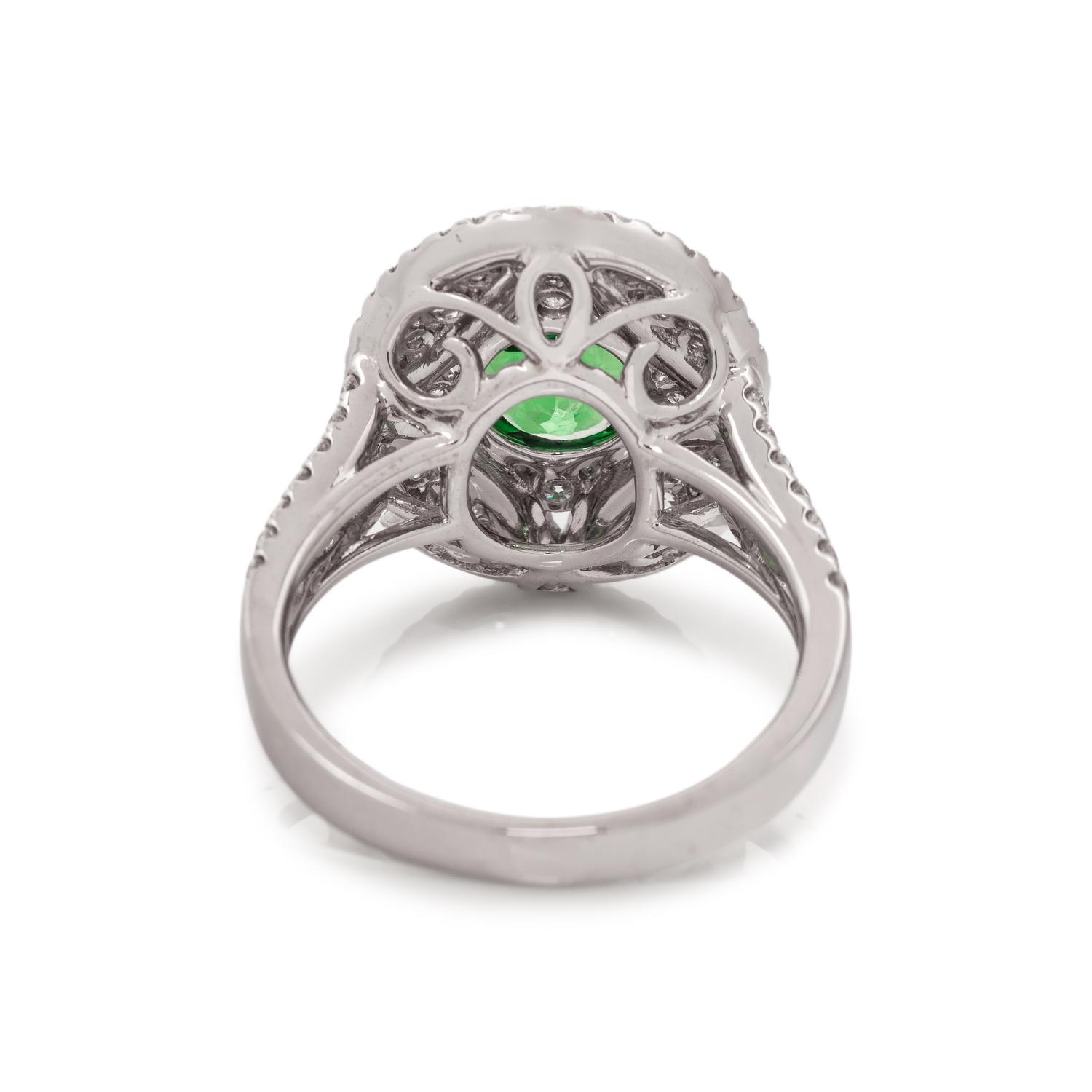 TSAVORITE GARNET AND DIAMOND RING