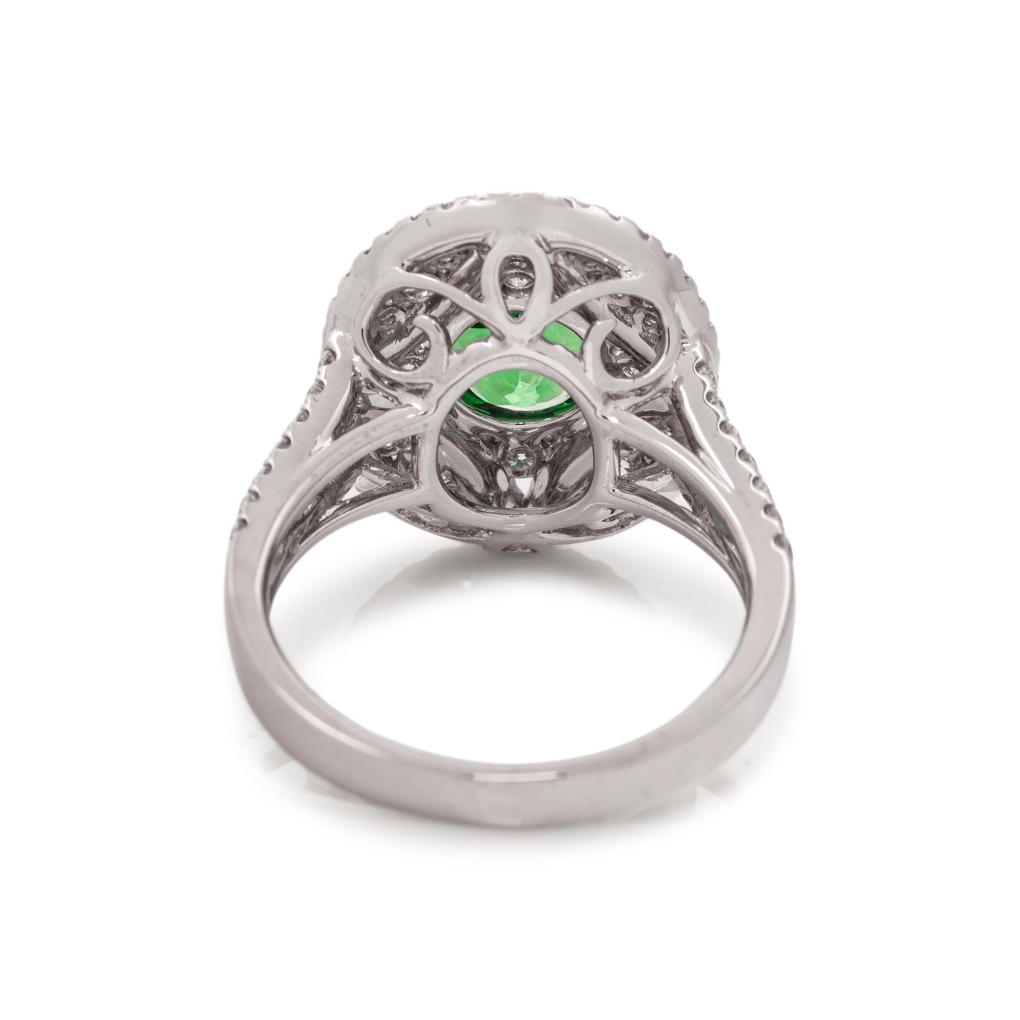 TSAVORITE GARNET AND DIAMOND RING