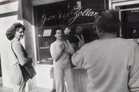 Garry Winogrand (1928-1984) Untitled (Two fans encountering a personality making the peace sign, Beverly Hills), from "Women are Better than Men...", 1982