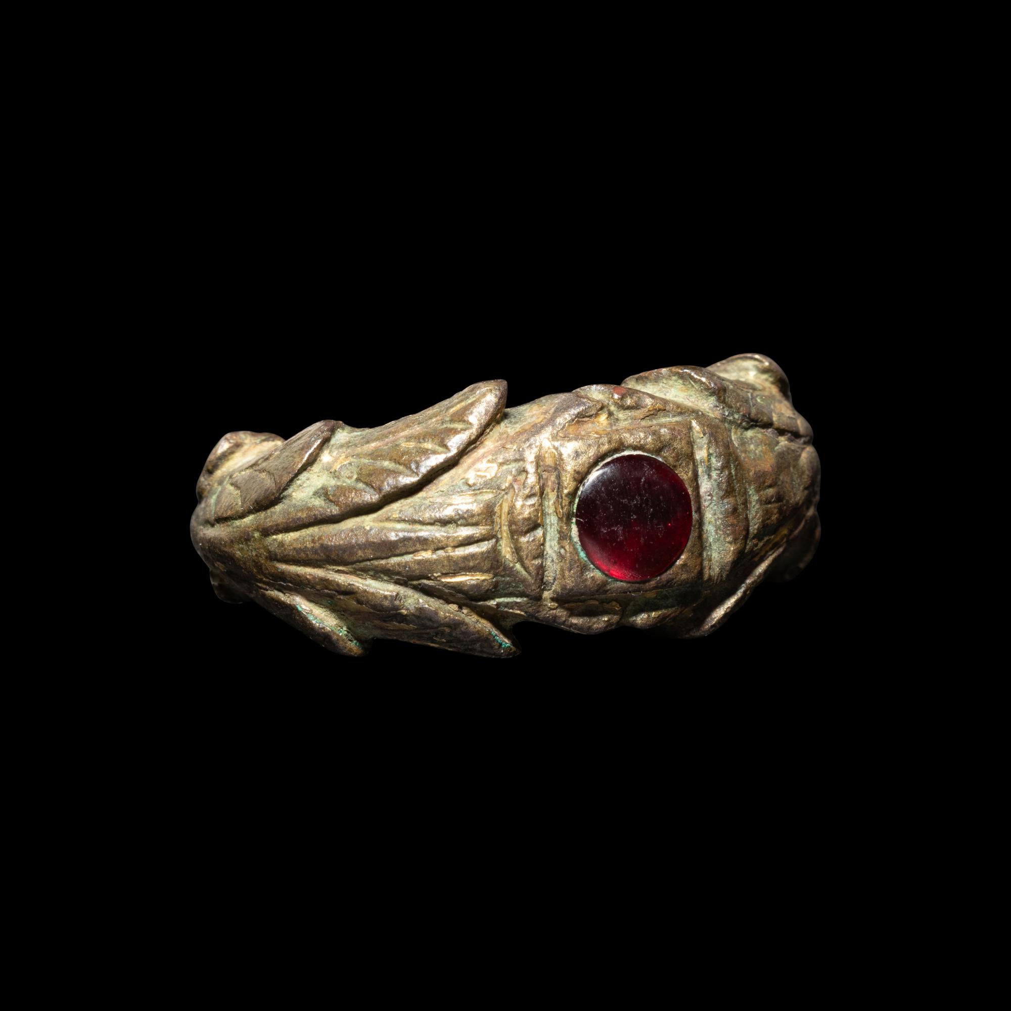 A Roman Gilt-Bronze and Garnet Ring
