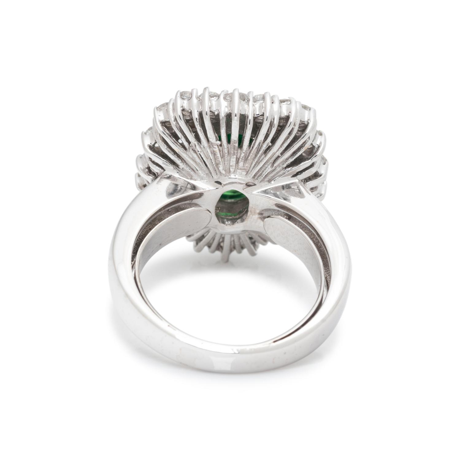 TSAVORITE GARNET AND DIAMOND RING