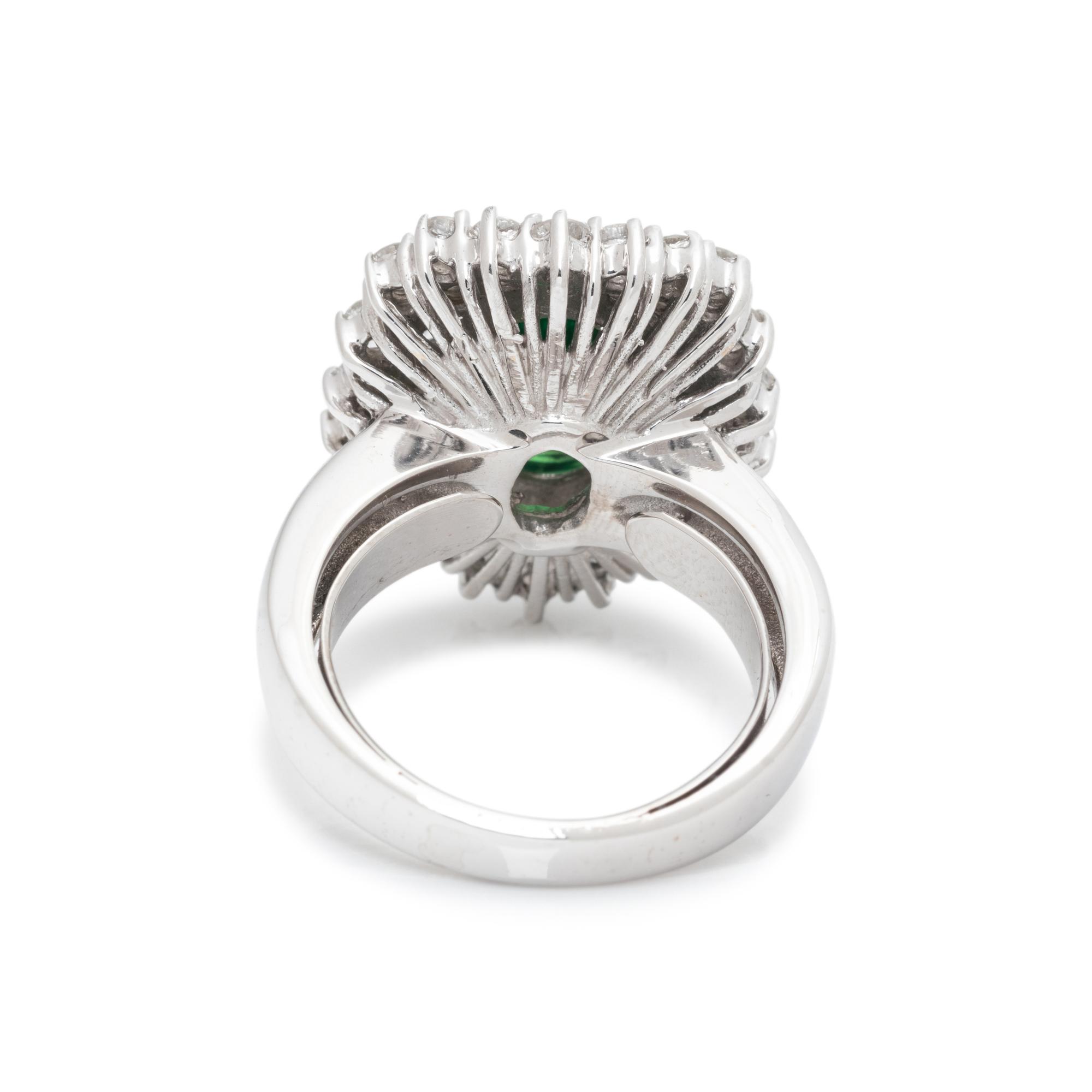 TSAVORITE GARNET AND DIAMOND RING