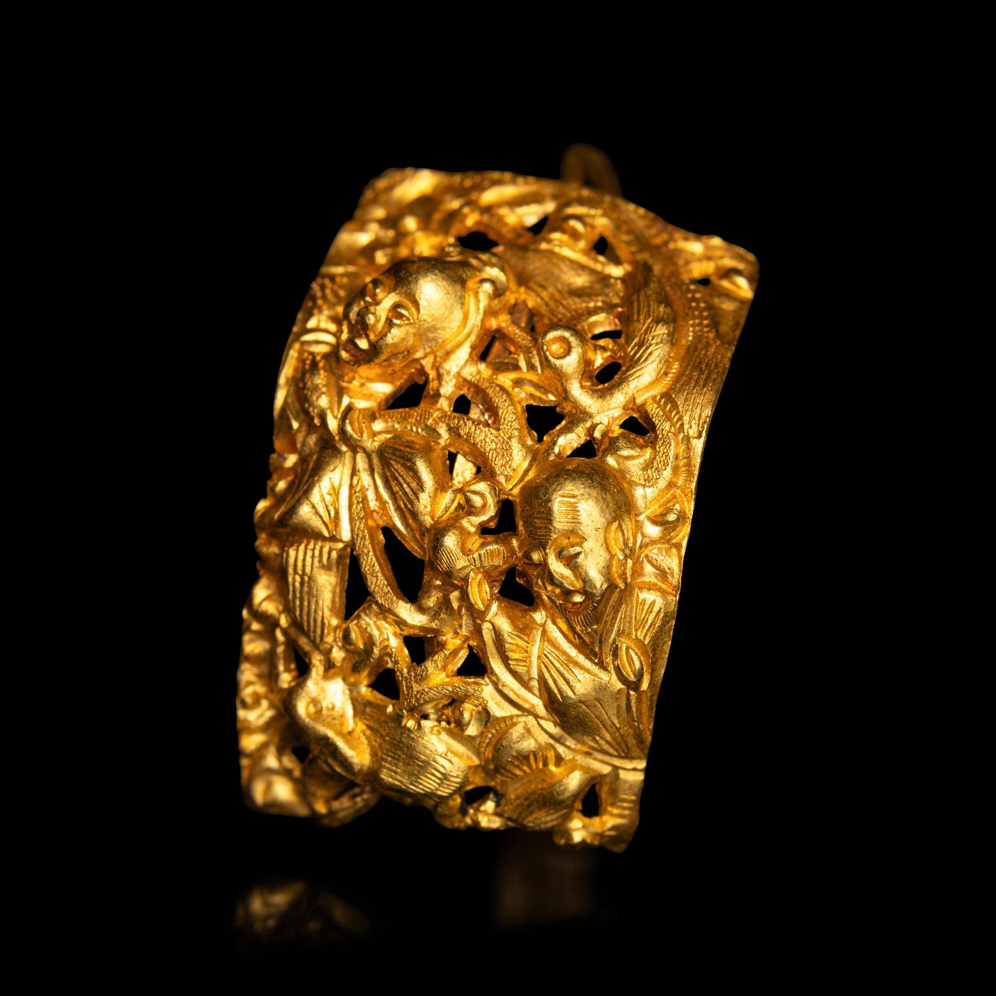 A Pair of Chinese Gold 'Figural and Fruits' Plaque Earrings, Paihuan, Qing Dynasty 清 童子瓜果紋 金 牌環一對