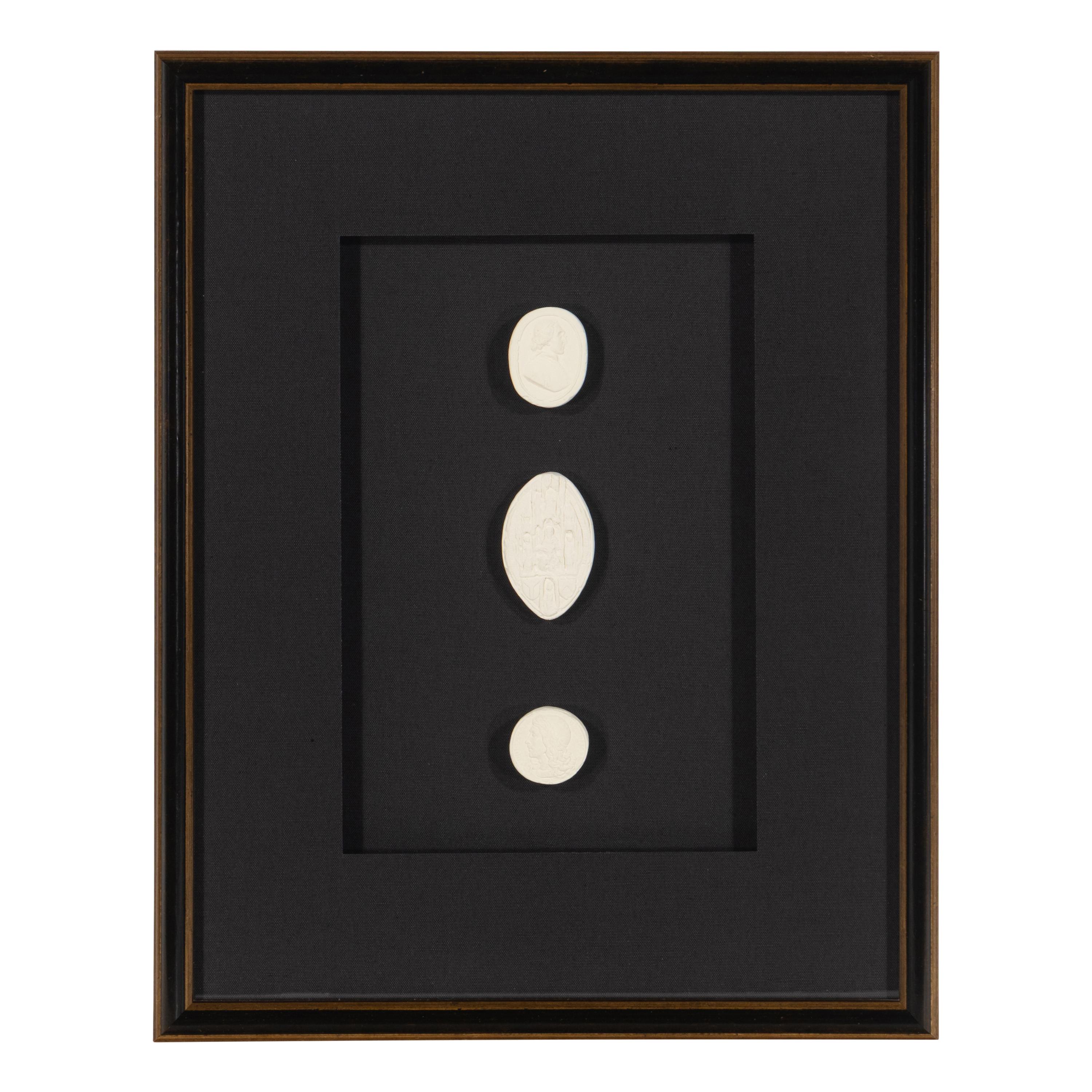 A Set of Three Framed Groups of Plaster Intaglios