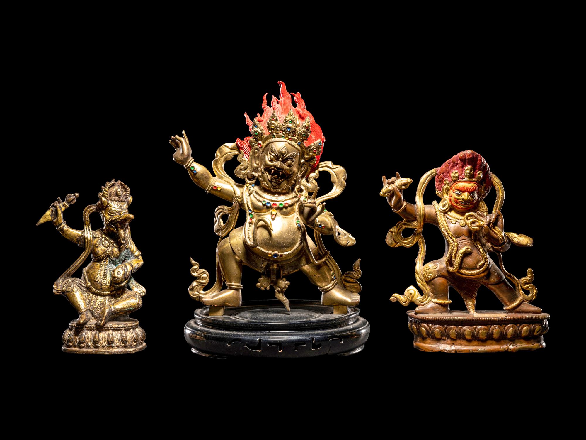 Three Tibetan Gilt Bronze Figures of Guardians