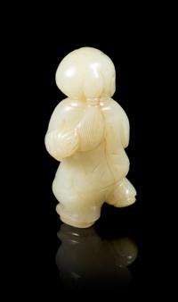 A Celadon Jade Figure of a Boy Height 2 7/8 inches. — 18TH/19TH CENTURY