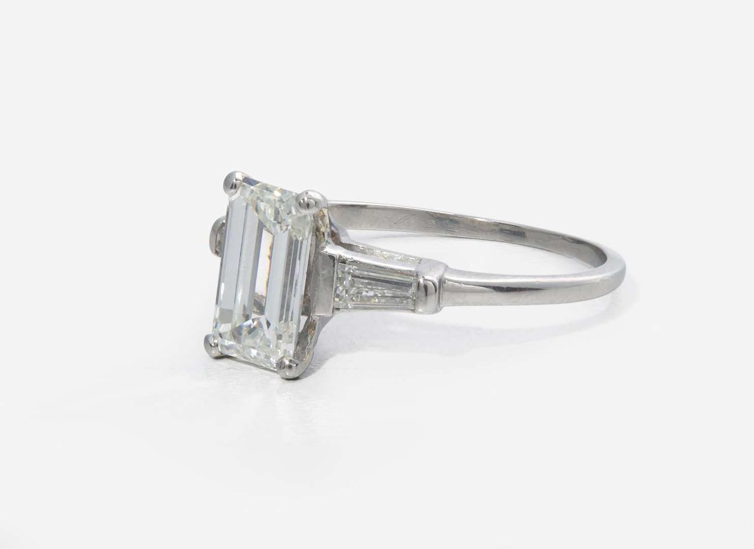 A Platinum and Diamond Ring with Ring Guards, 1.61 Carat Emerald-Cut Diamond, GIA Certified