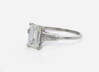 A Platinum and Diamond Ring with Ring Guards, 1.61 Carat Emerald-Cut Diamond, GIA Certified