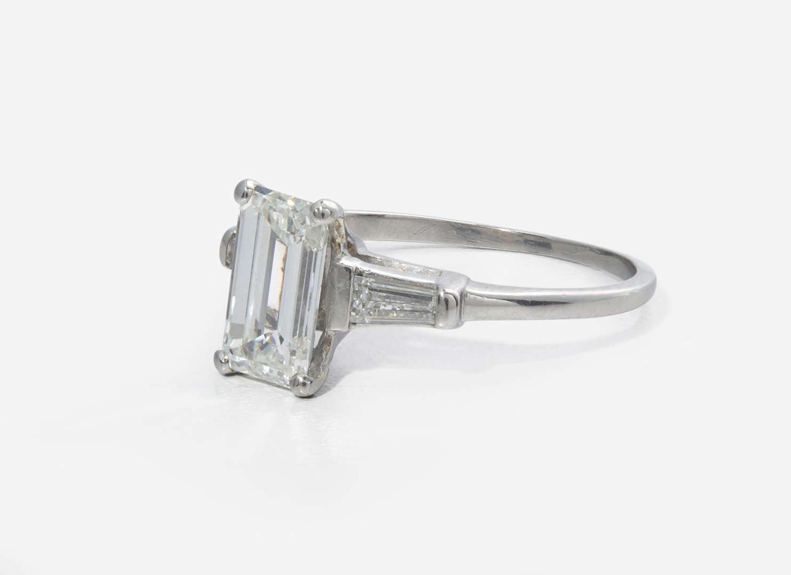 A Platinum and Diamond Ring with Ring Guards, 1.61 Carat Emerald-Cut Diamond, GIA Certified
