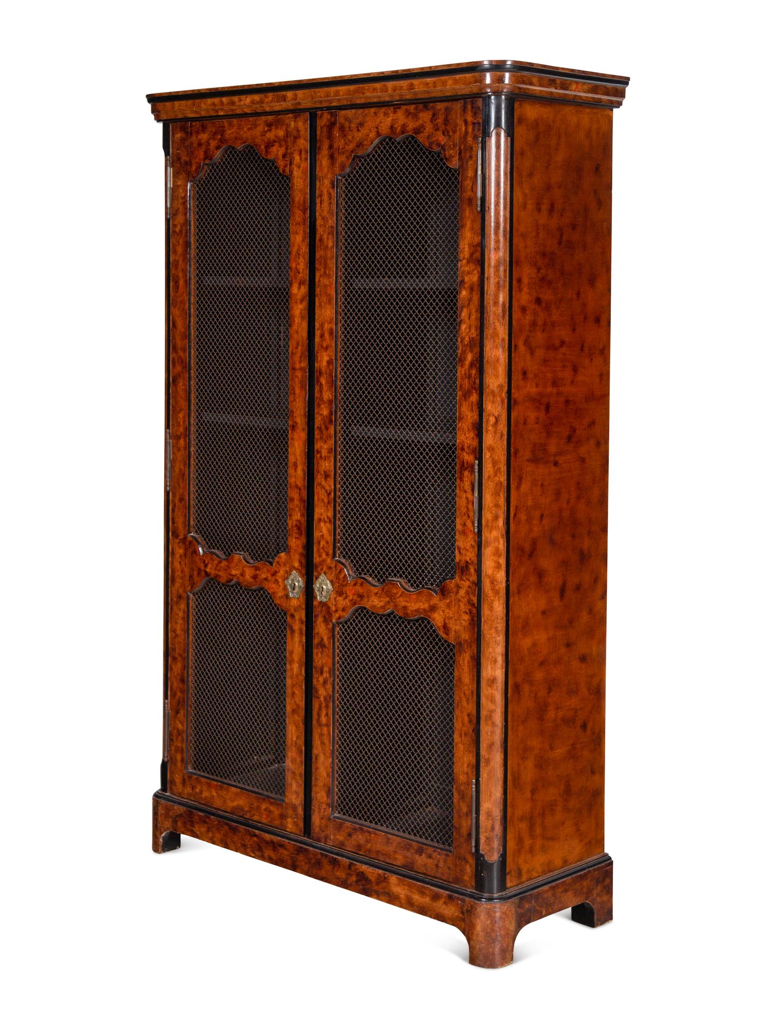 A Pair of Régence Style Faux Bois Painted Bookcases
