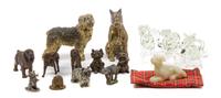 A Collection of Fourteen Dog Figures of Various Breeds Height of tallest 4 1/4 inches.