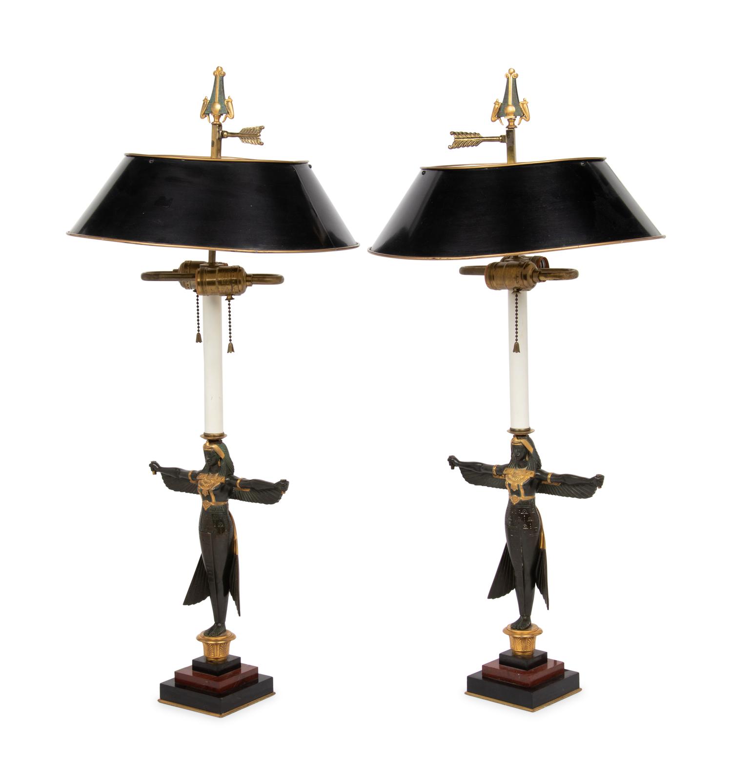 A Pair of Egyptian Revival Parcel Gilt Bronze Figures Mounted as Lamps with Tole Shades