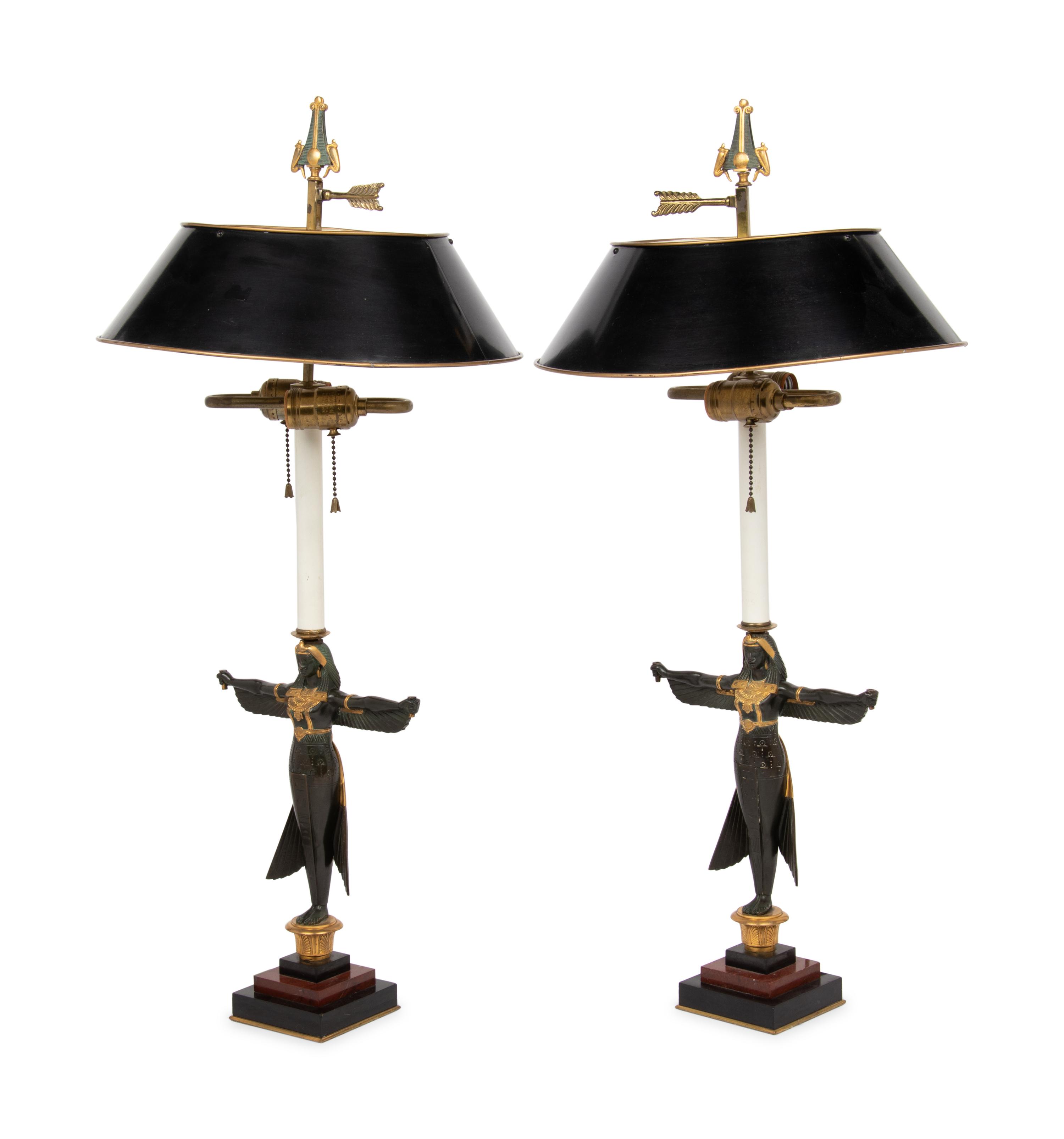 A Pair of Egyptian Revival Parcel Gilt Bronze Figures Mounted as Lamps with Tole Shades
