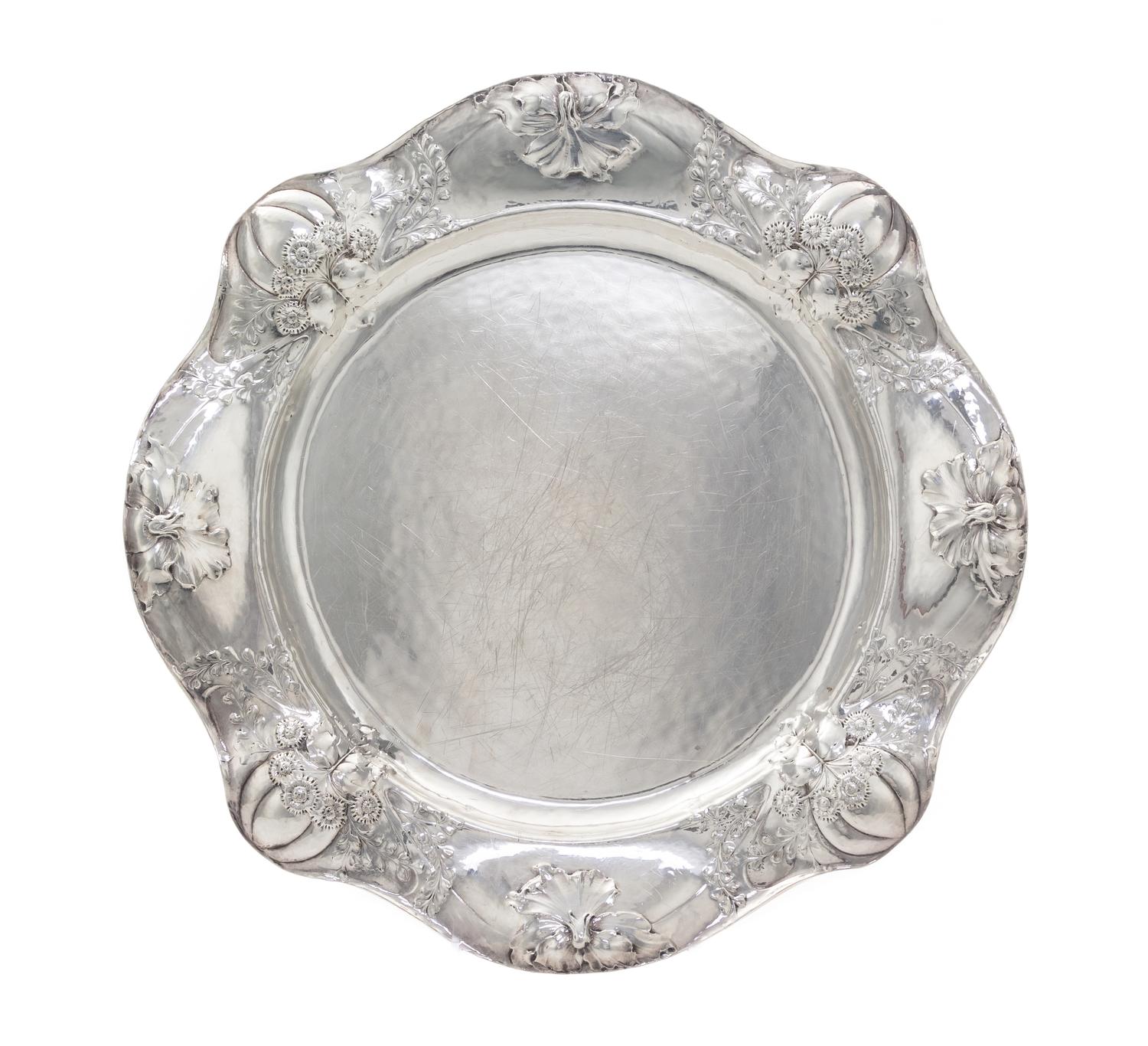 An American Silver Martele Entree Dish, Gorham Mfg. Co., Providence, RI, 1908, shaped circular, the undulating border chased with gourd