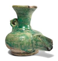 A Persian Green Glazed Vessel