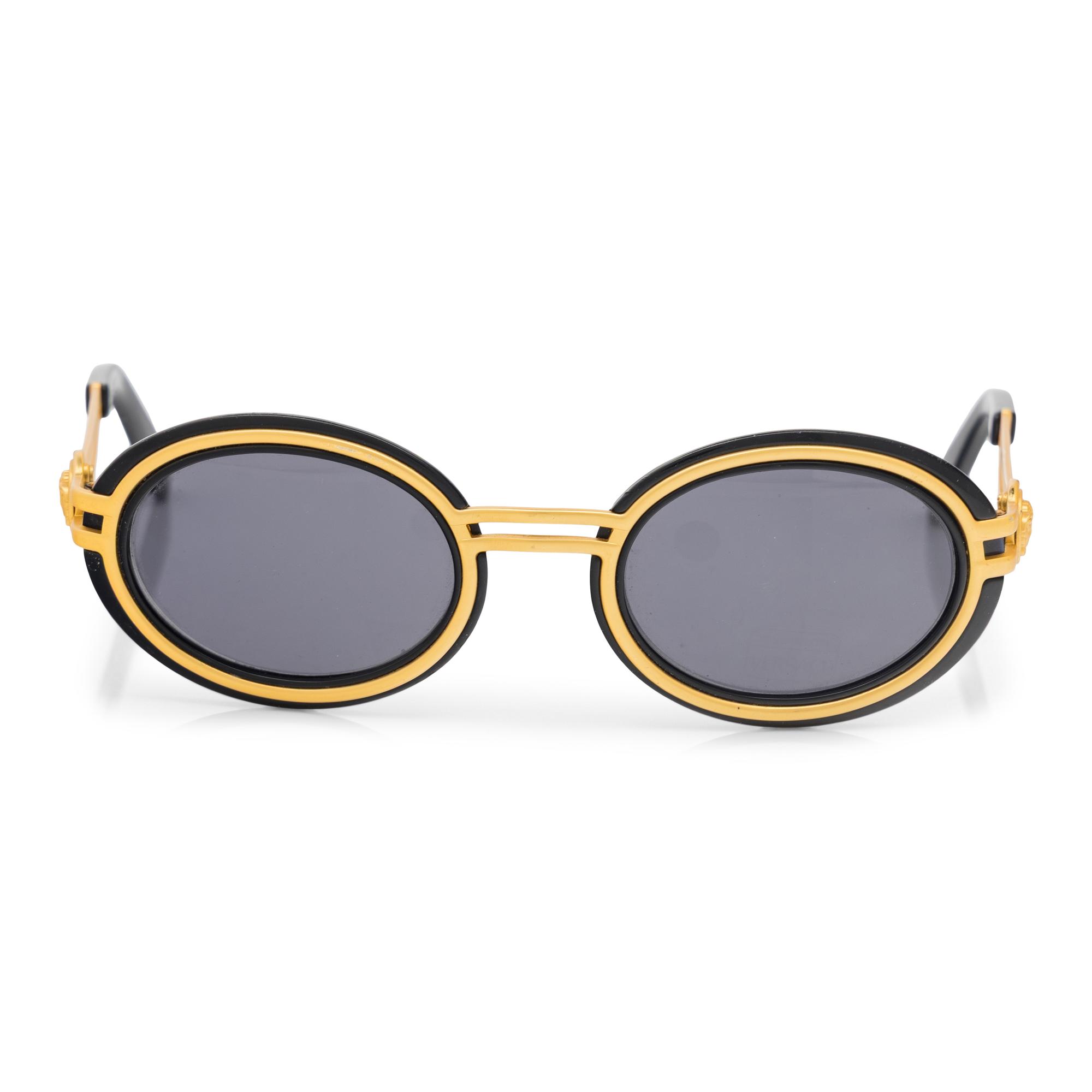 A Pair of Vintage Gianni Versace Sunglasses