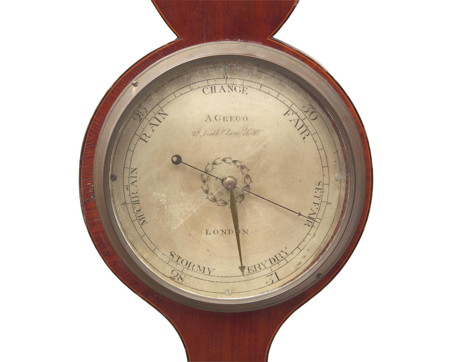 A Regency Inlaid Mahogany Wheel Barometer