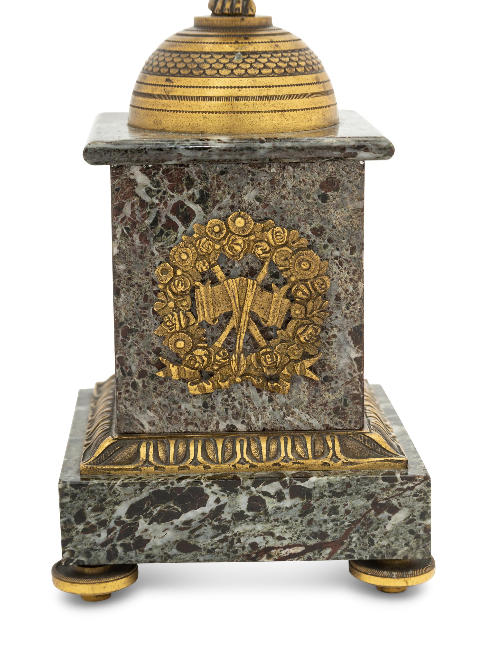 A Pair of Empire Style Gilt Bronze and Marble Four-Light Candelabra