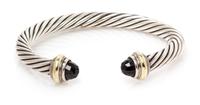 A Sterling Silver, 14 Karat Yellow Gold and Onyx 'Cable Classics' Bracelet, David Yurman, 26.75 dwts.