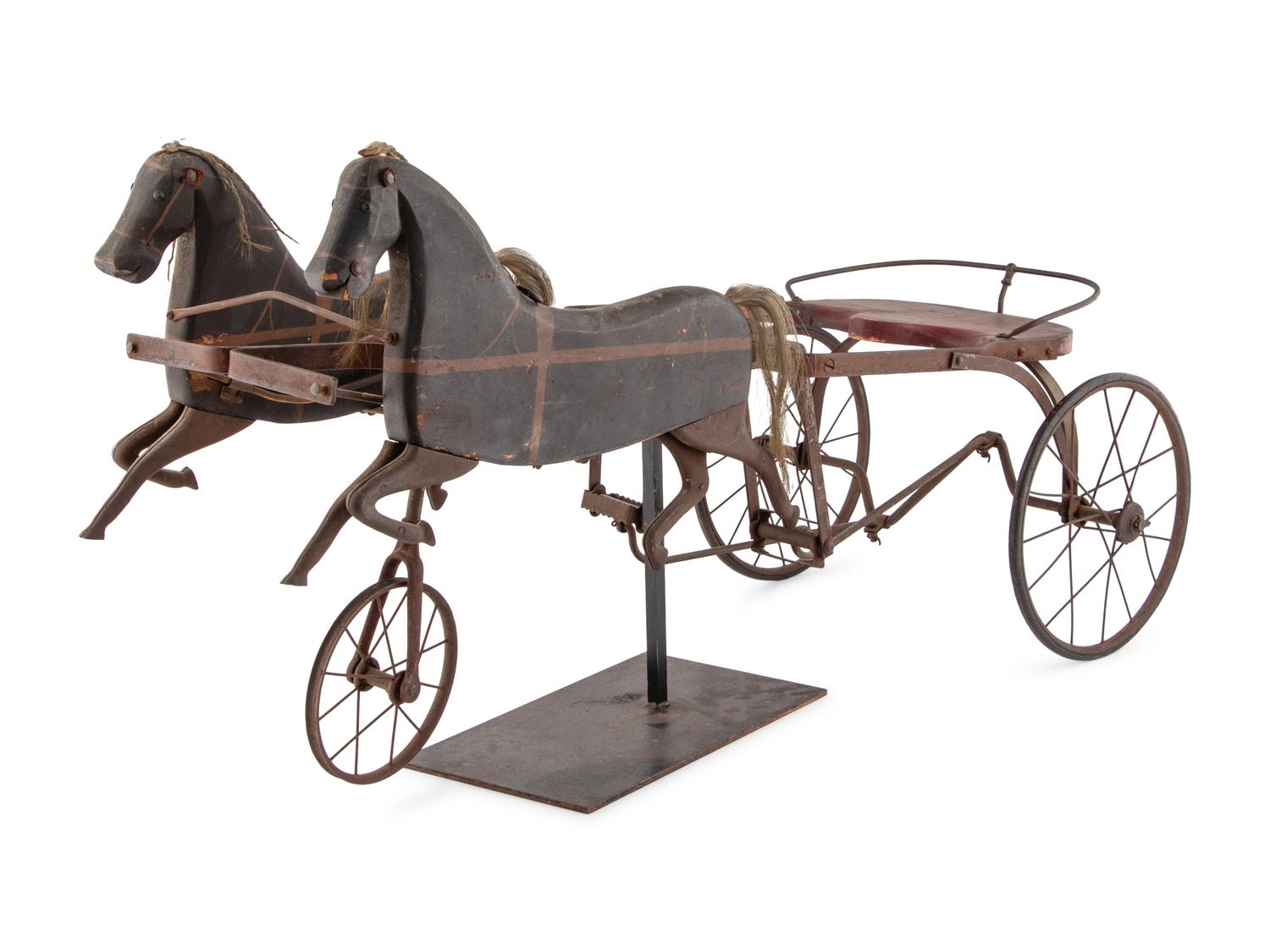 A Child's Carved Wood and Wrought Iron Two Horse Pedal Wagon