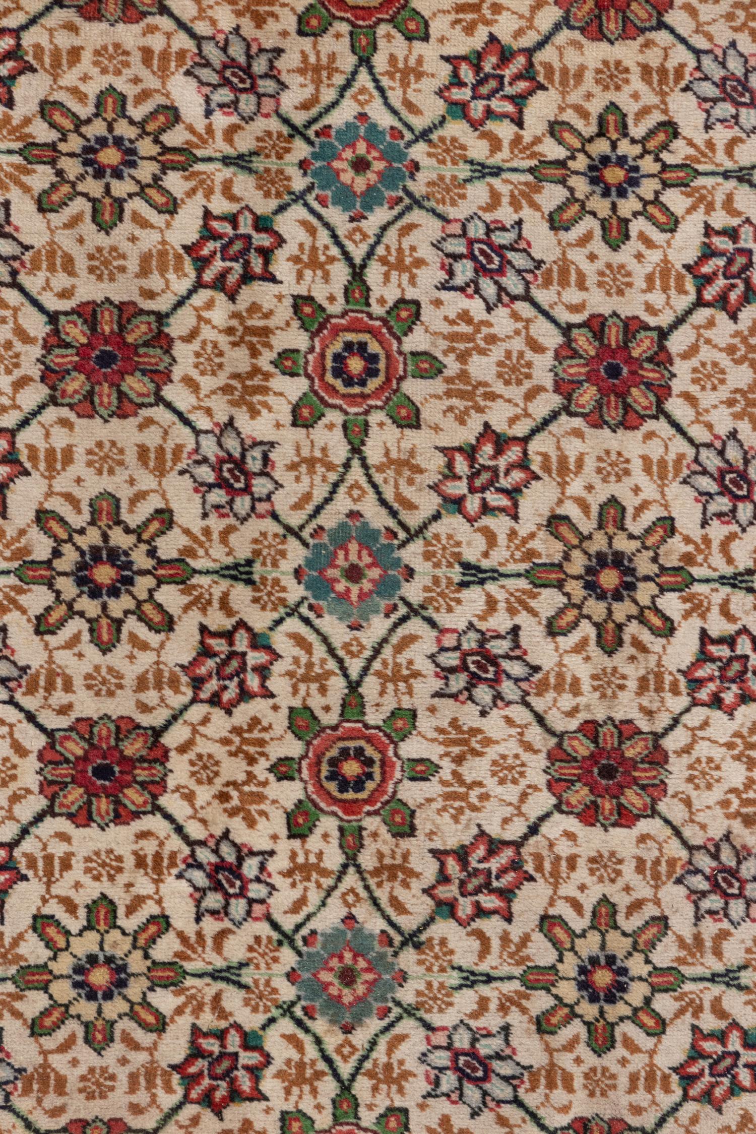 A Tabriz Wool Rug