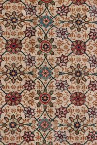 A Tabriz Wool Rug