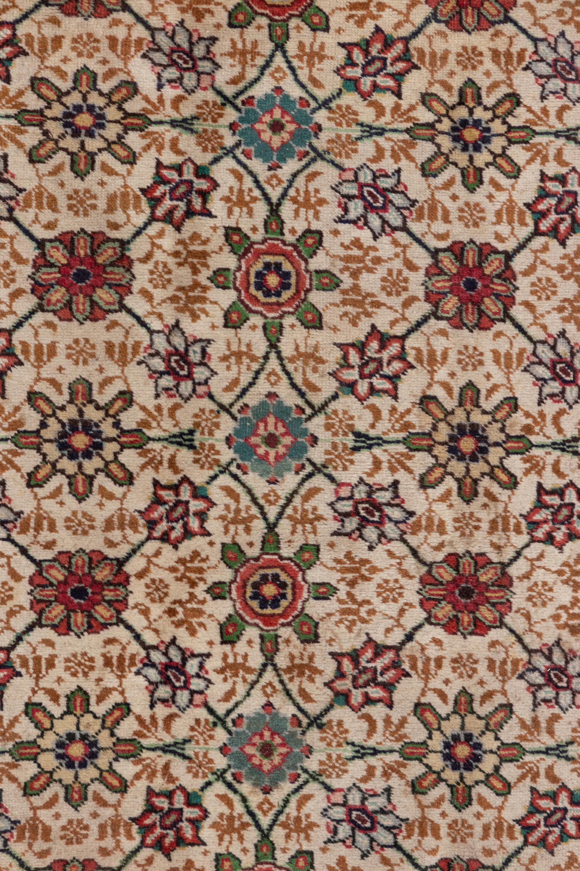 A Tabriz Wool Rug
