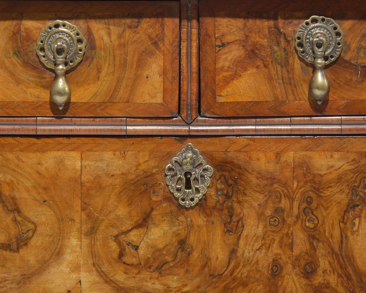 A William & Mary burl walnut-veneered double-domed secretary desk, circa 1700