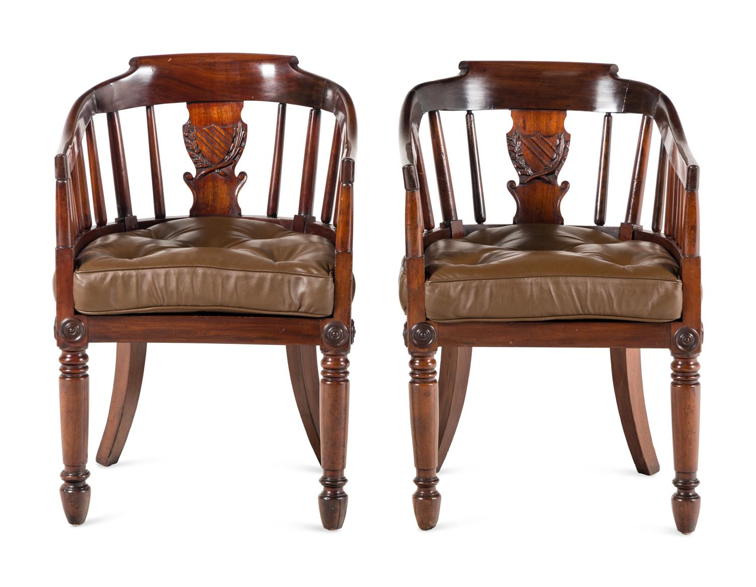 A Pair of English Mahogany and Leather-Upholstered Desk Chairs