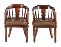 A Pair of English Mahogany and Leather-Upholstered Desk Chairs