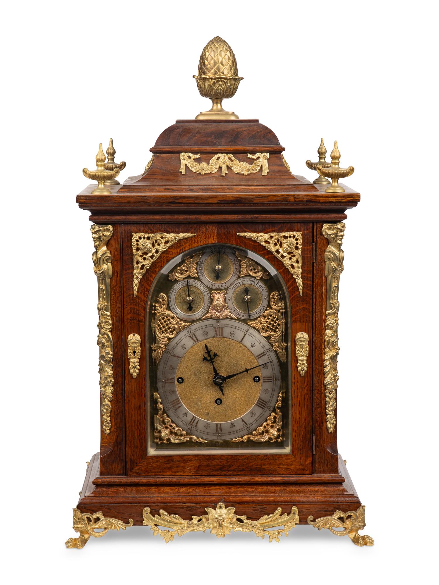 A George II Style Gilt Bronze Mounted Oak Bracket Clock