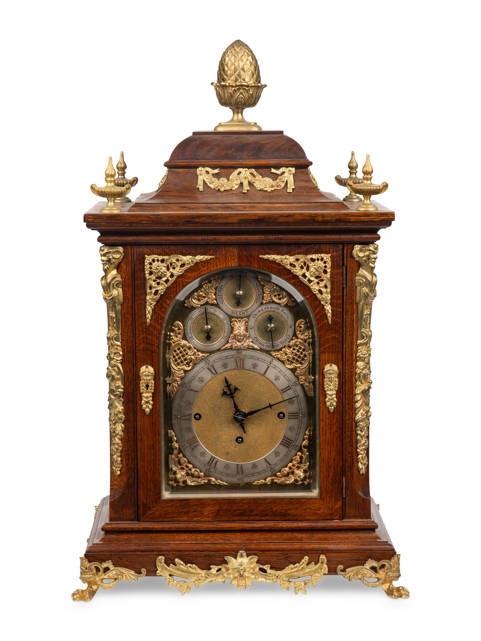A George II Style Gilt Bronze Mounted Oak Bracket Clock