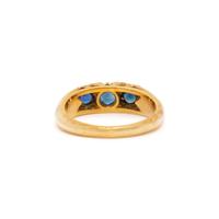 YELLOW GOLD, SYNTHETIC SAPPHIRE AND DIAMOND RING