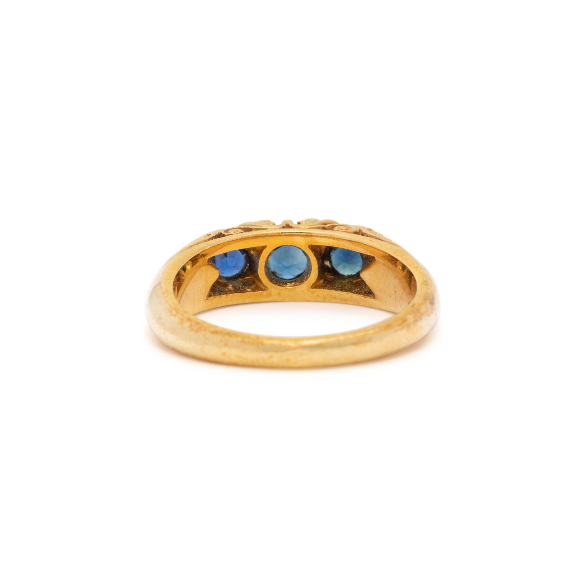 YELLOW GOLD, SYNTHETIC SAPPHIRE AND DIAMOND RING