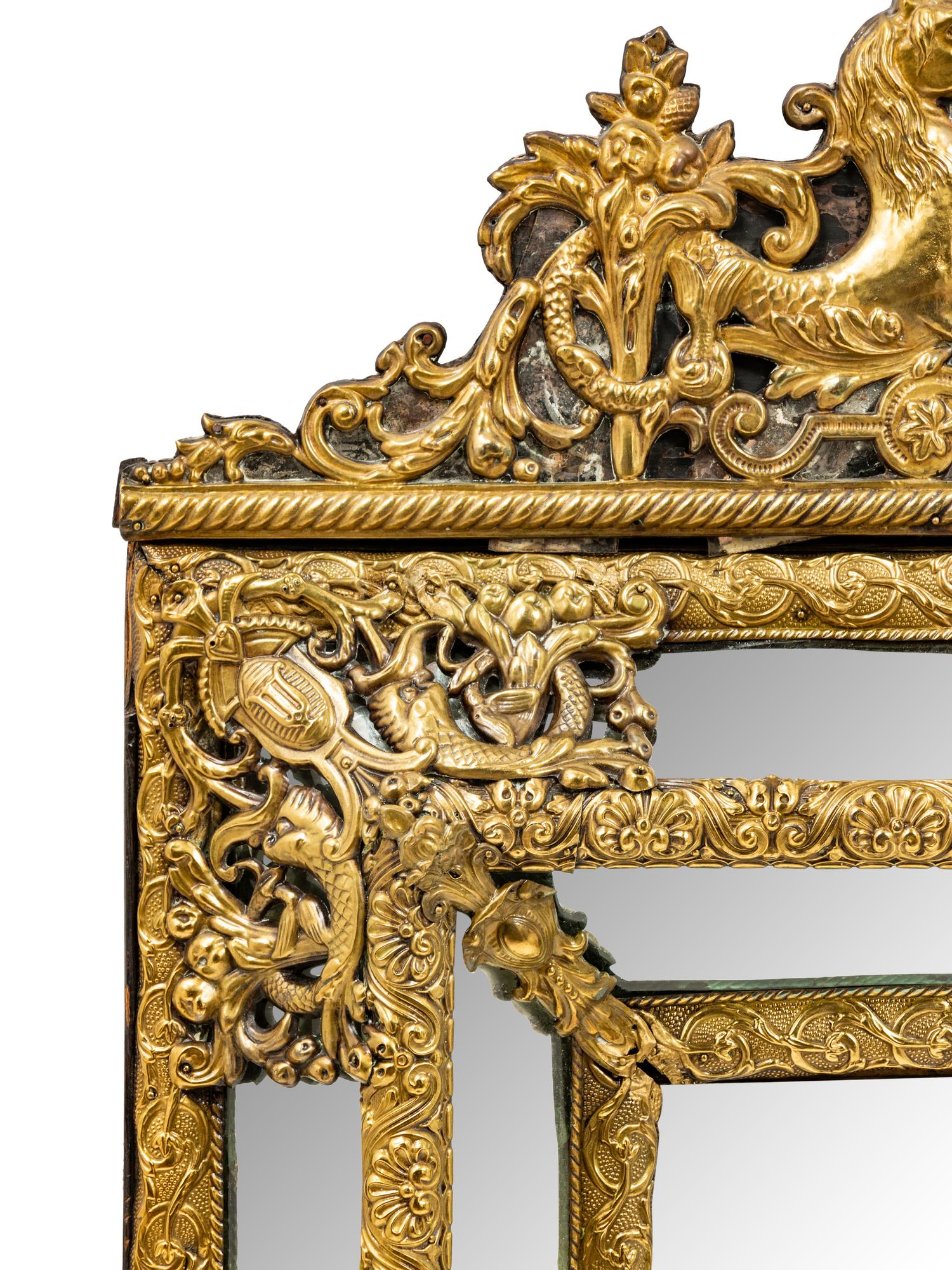 A Brass Embossed Venetian Style Mirror